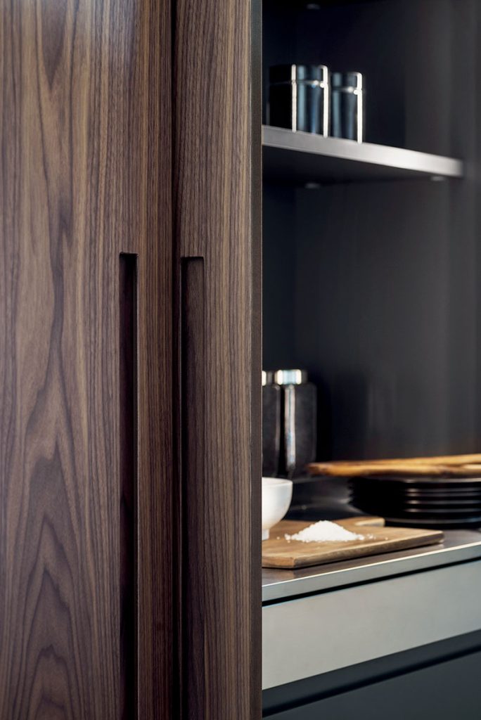 Contemporary steel and wood kitchen Italian design Ireland pocket doors Clontarf Raheny Sutton Howth Portmarnock Malahide North Dublin