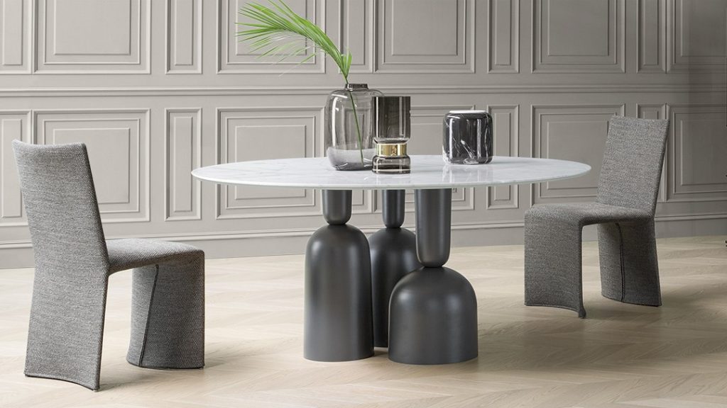 Bonaldo Cop dining table. marble top with pod bases. Italian modern furniture in Dublin Ireland. Best dining tables in Dublin